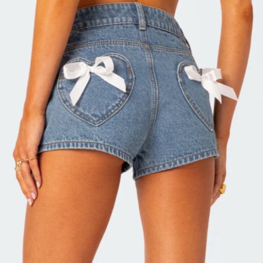 Edikted Blue Denim Heart Pocket Jean Shorts with White Bows